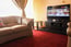 Comfy Cosy Lounge With A Carpet To Give You That Homely Feel. It Comes With Leather Couches. 40 Inch Samsung With Dstv/cable Tv 1 of 10